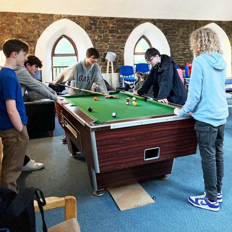 Teens playing pool at StreetLevel